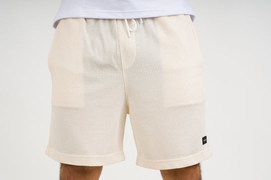 Pantaloneta Text Q Crema