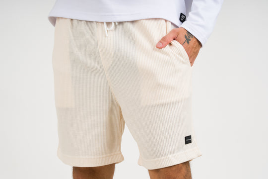 Pantaloneta Text Q Crema